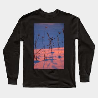 silhouettes of dry grass at sunset in a snowy field Long Sleeve T-Shirt